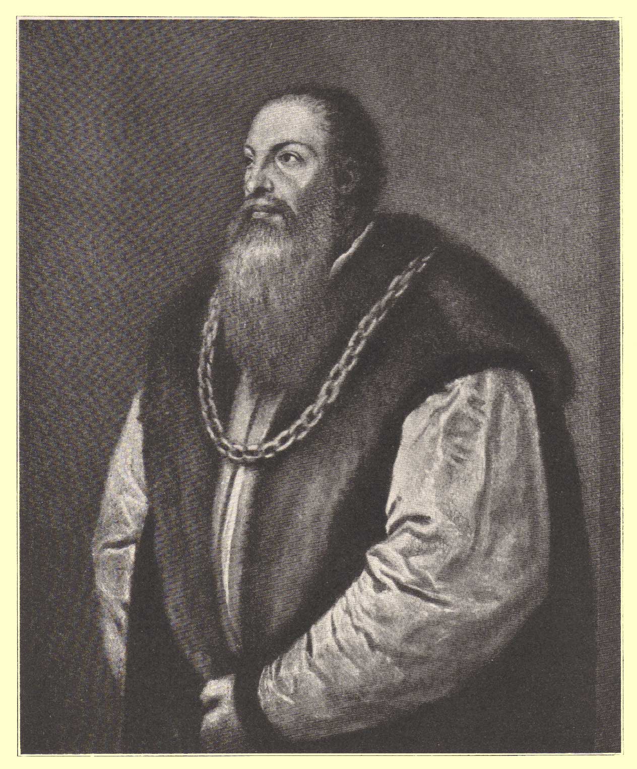 A Black and White Picture of the Portrait of Pietro Aretino by Titian, he has a long beard and short hair, wearing a vest made of fur, his shirt has light full sleeves, and he has a thick gold chain worn as a necklace, presumably the one given to him by Francis I.