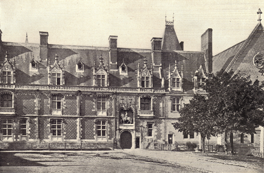 Black and white photograph of a portion of the Chateau du Blois, France, with a grassy courtyard with a few trees before it, taken in the late 19th century.