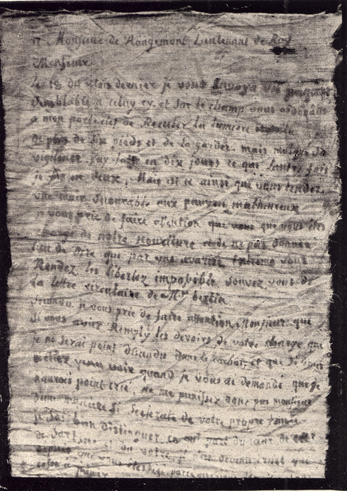 A black and white picture of the start of a letter written with blood on linen by Latude, to Rougemont.