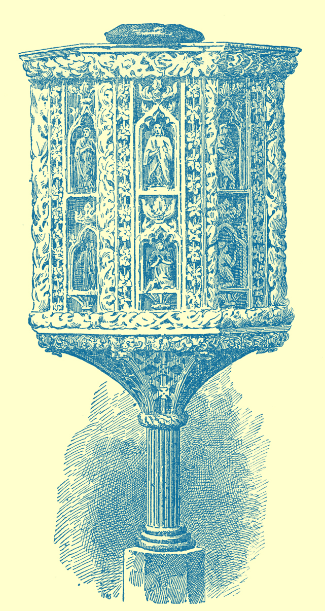 A richly carved stone pulpit erected on a column at St. Thomas à Becket Church in Bovey Tracey, England.