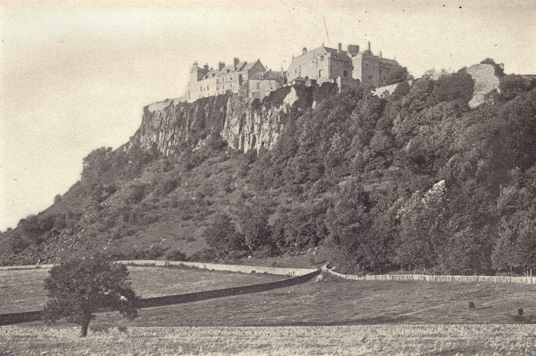 Black and white photograph of Stirling, Castle, twelfth century on a tree-covered hill, taken in the late 19th century.