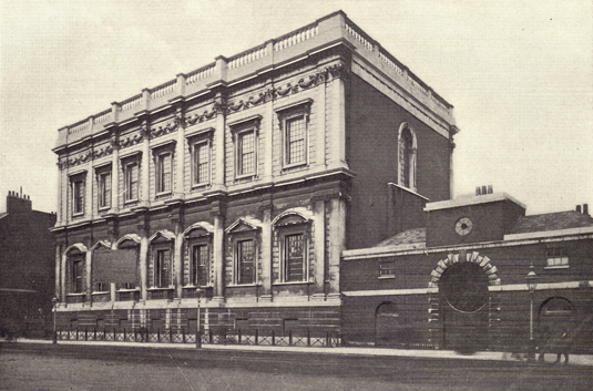 Black and white photograph of Whitehall Palace, in England, taken in the late 19th century.